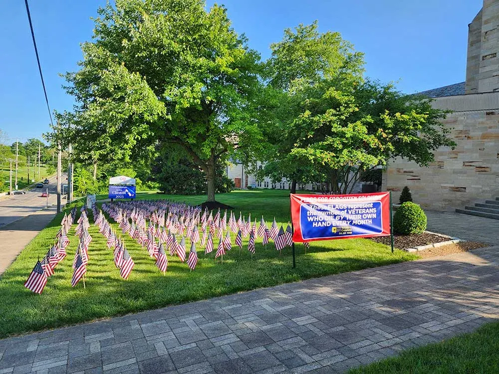 An American flag at a Memorial Day tribute — the kind of image that started this workshop.